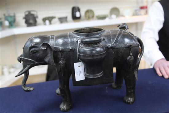 A massive Chinese bronze elephant-form censer, Ming dynasty, height 65cm length 50cm